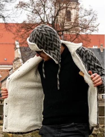 Men's wool hat with earflaps. Made of sheep wool with a geometric pattern.