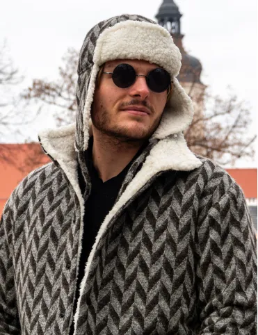 Men's wool hat with earflaps. Made of sheep wool with a geometric pattern.